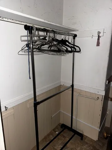 a view of a room with rack on the wall