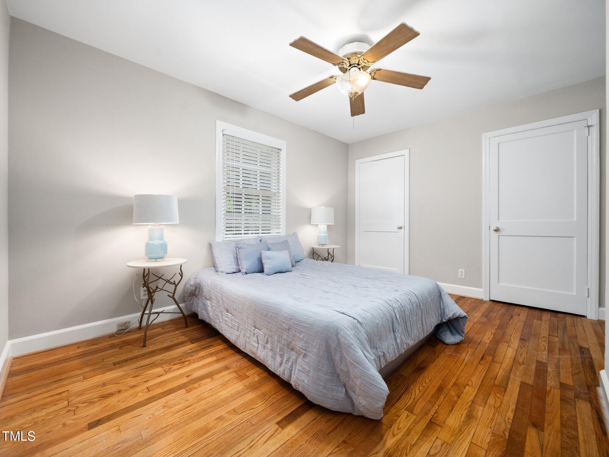1313 Ridge Road Raleigh, NC 27607 - Photo 18 of 37 a bedroom with a bed and a window