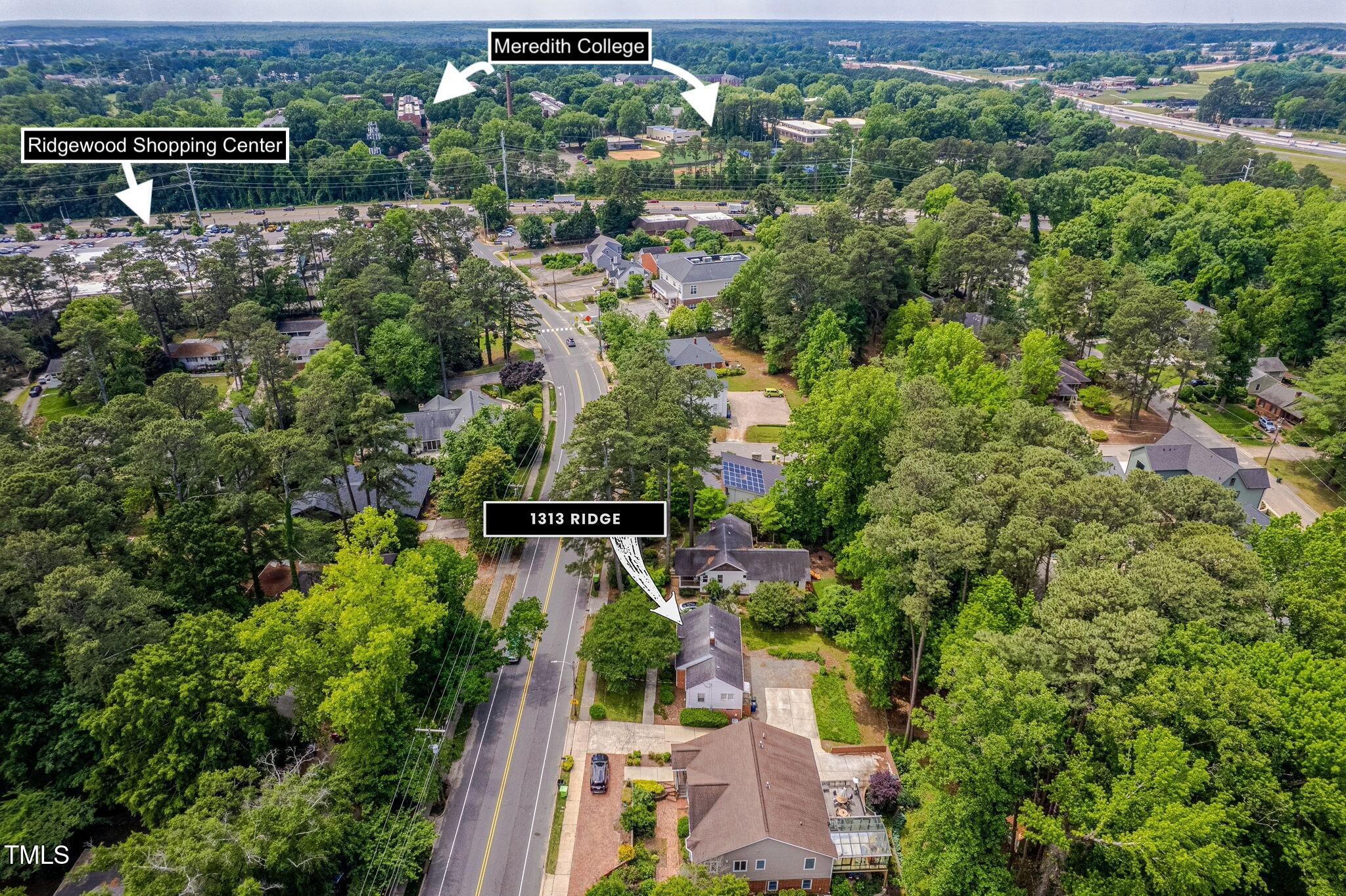 1313 Ridge Road Raleigh, NC 27607 - Photo 32 of 37 an aerial view of a house with a yard