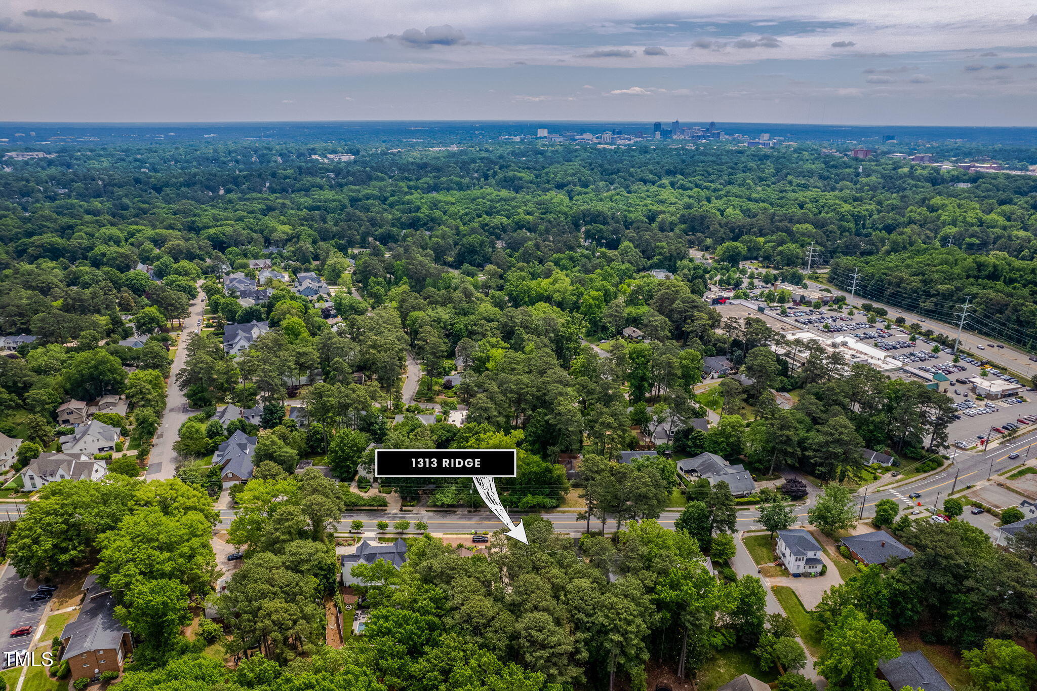 1313 Ridge Road Raleigh, NC 27607 - Photo 33 of 37 an aerial view of a house with a yard