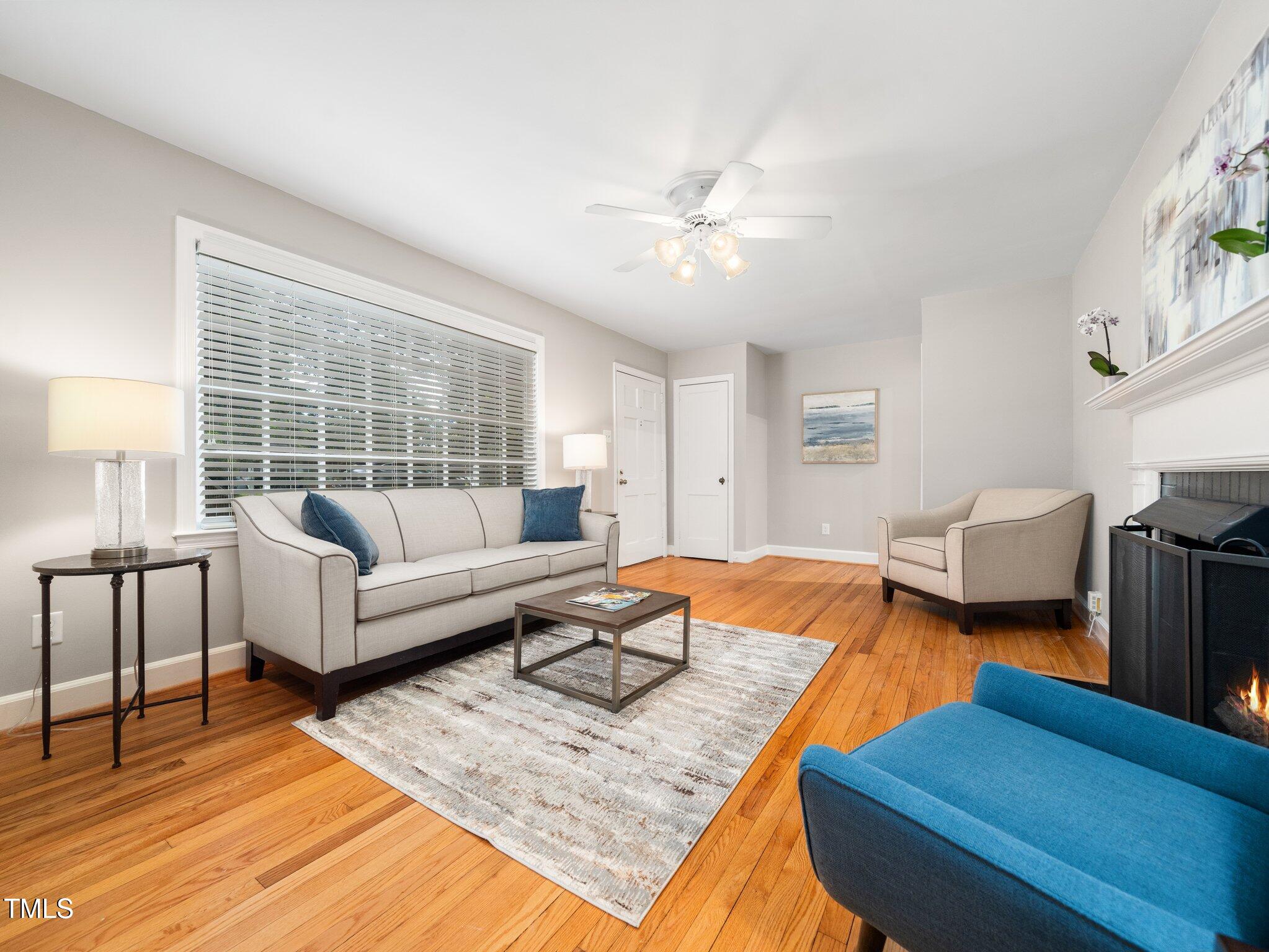 1313 Ridge Road Raleigh, NC 27607 - Photo 7 of 37 a living room with furniture and a window