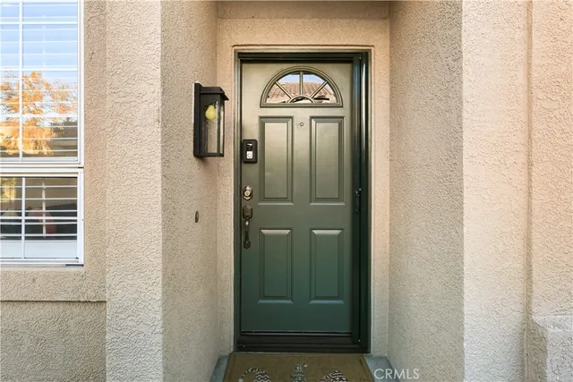 a view of a door and utility room