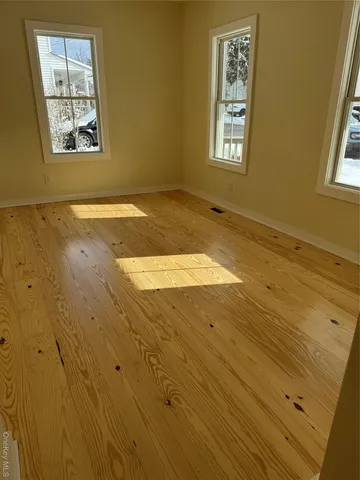 a view of an empty room and window