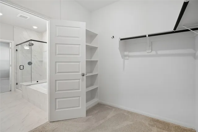 a view of a house with a backyard of a house