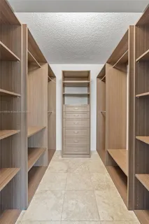 a view of room with walk in closet