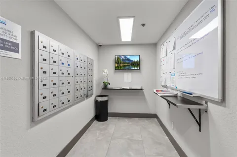 a kitchen with stainless steel appliances a sink stove and cabinets