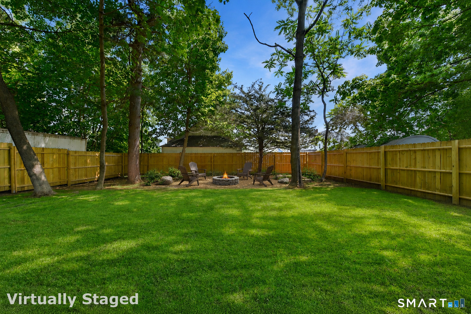 63 Park Road Hamden, CT 06517 - Photo 33 of 39 Beautiful yard with recently planted grass and NEW wood panel fence!