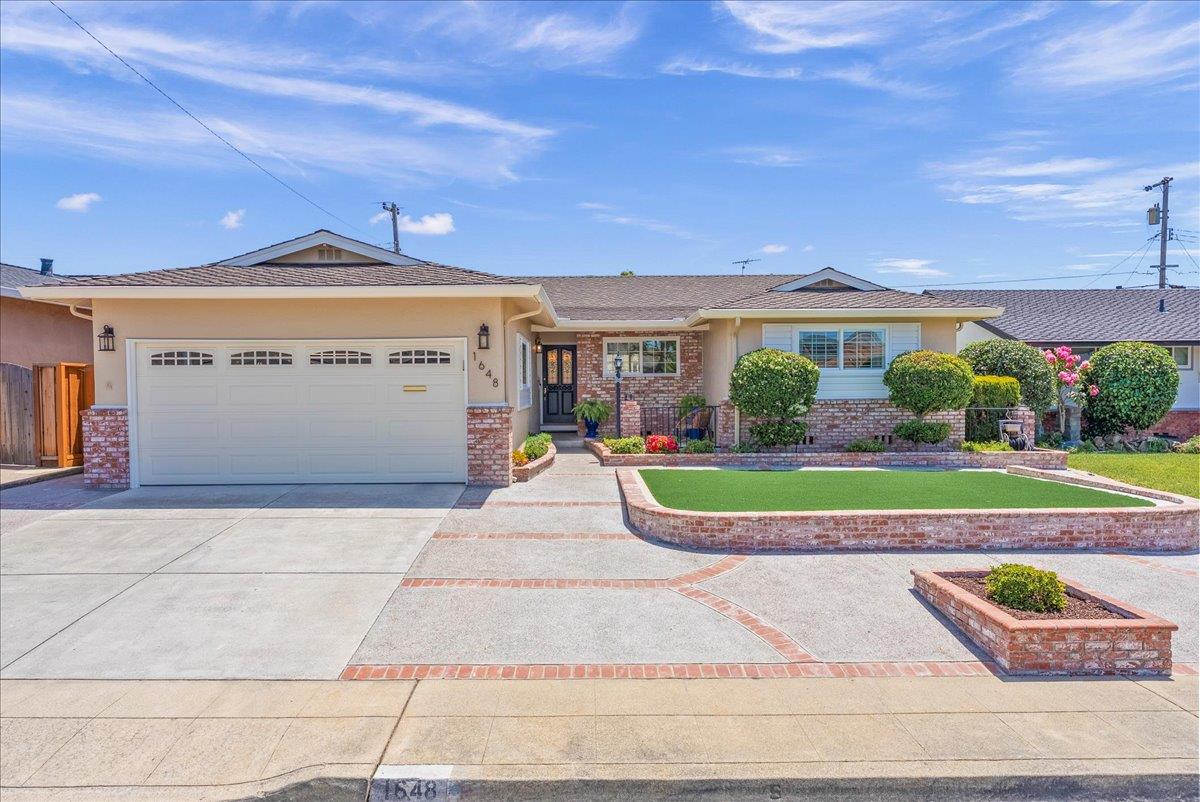 1648 Mt Rainier Avenue Milpitas, CA 95035 - Photo 1 of 34 a view of outdoor space yard and front view of a building