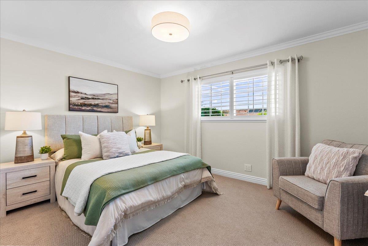 1648 Mt Rainier Avenue Milpitas, CA 95035 - Photo 18 of 34 a bed room with a bed and a couch