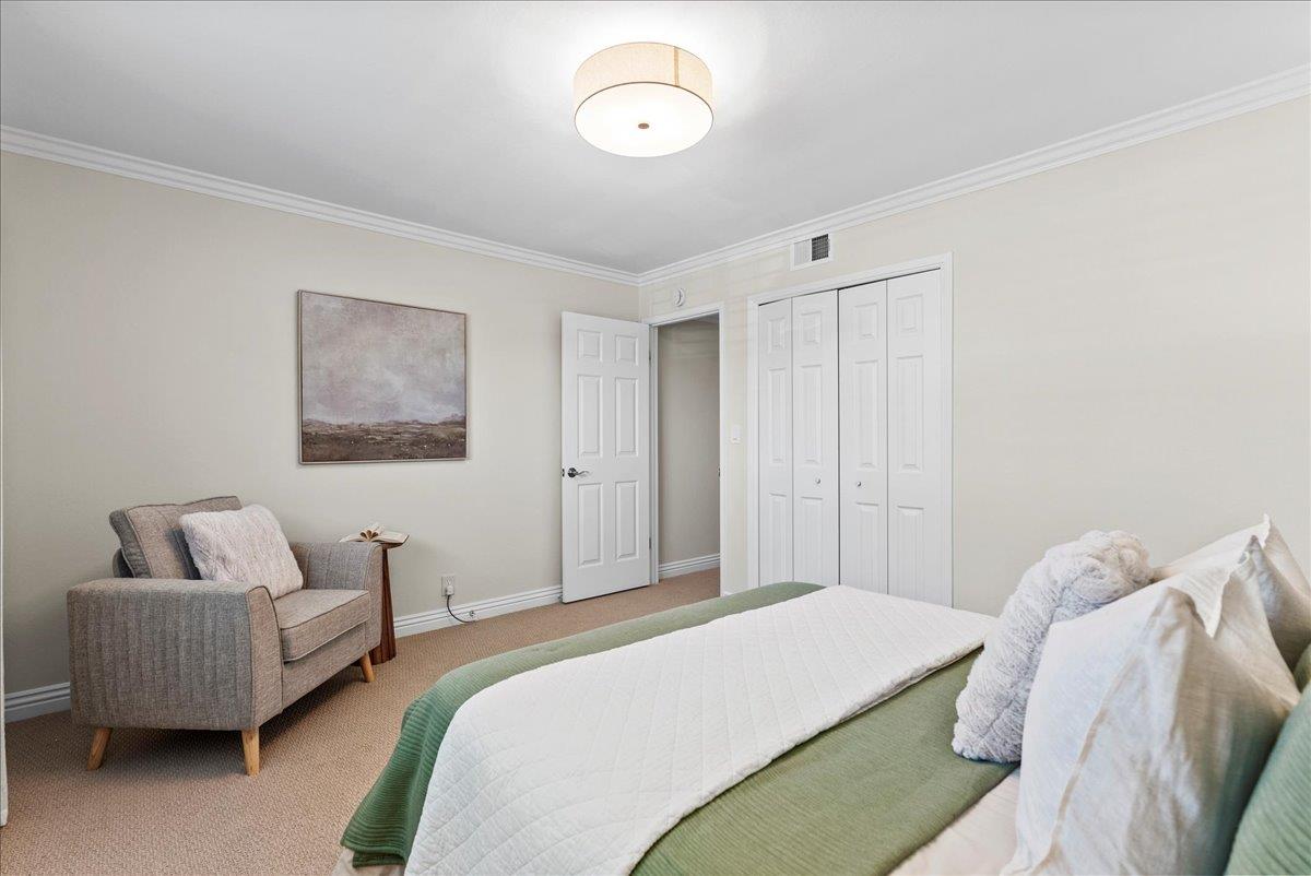 1648 Mt Rainier Avenue Milpitas, CA 95035 - Photo 19 of 34 a bedroom with a bed and a couch