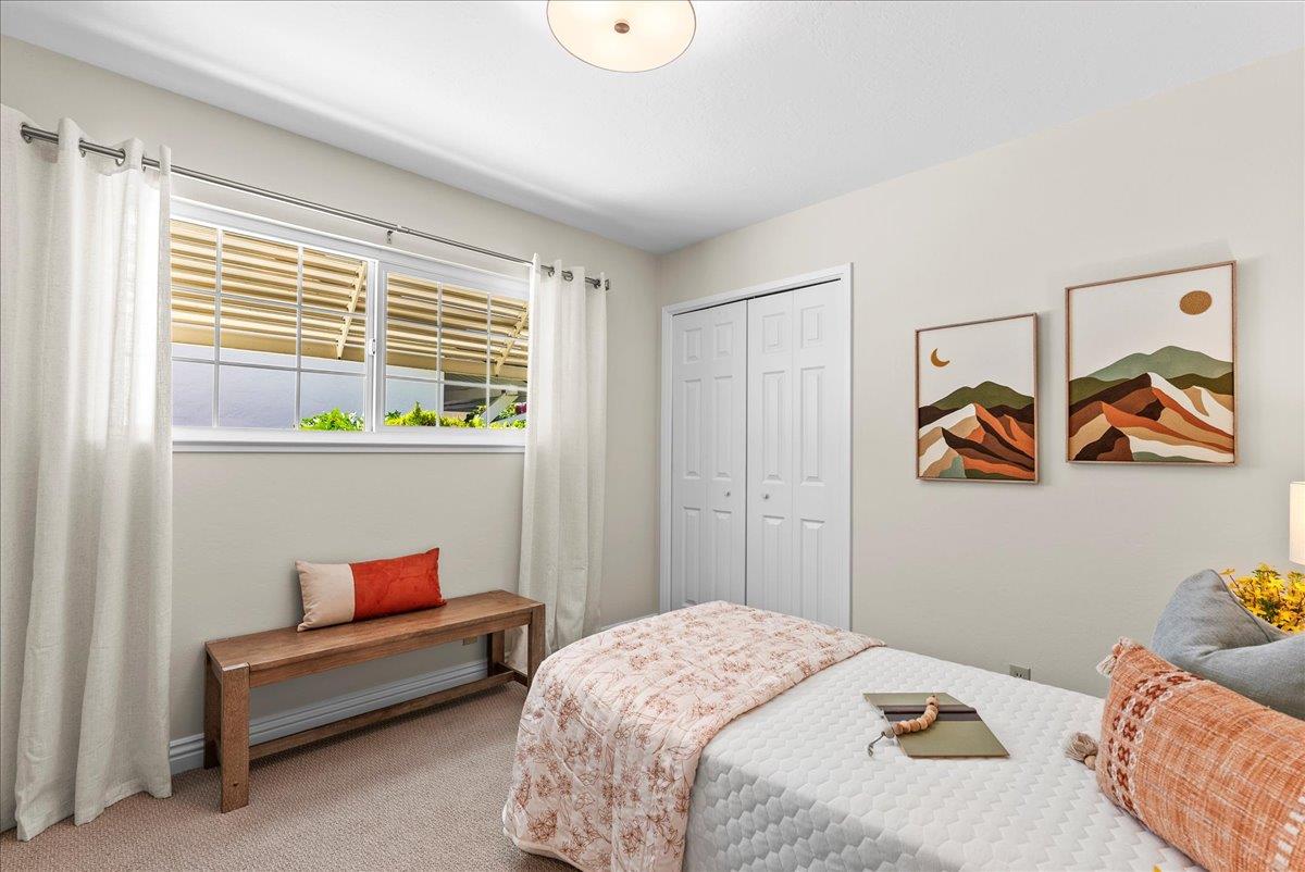1648 Mt Rainier Avenue Milpitas, CA 95035 - Photo 20 of 34 a bedroom with a bed and a couch