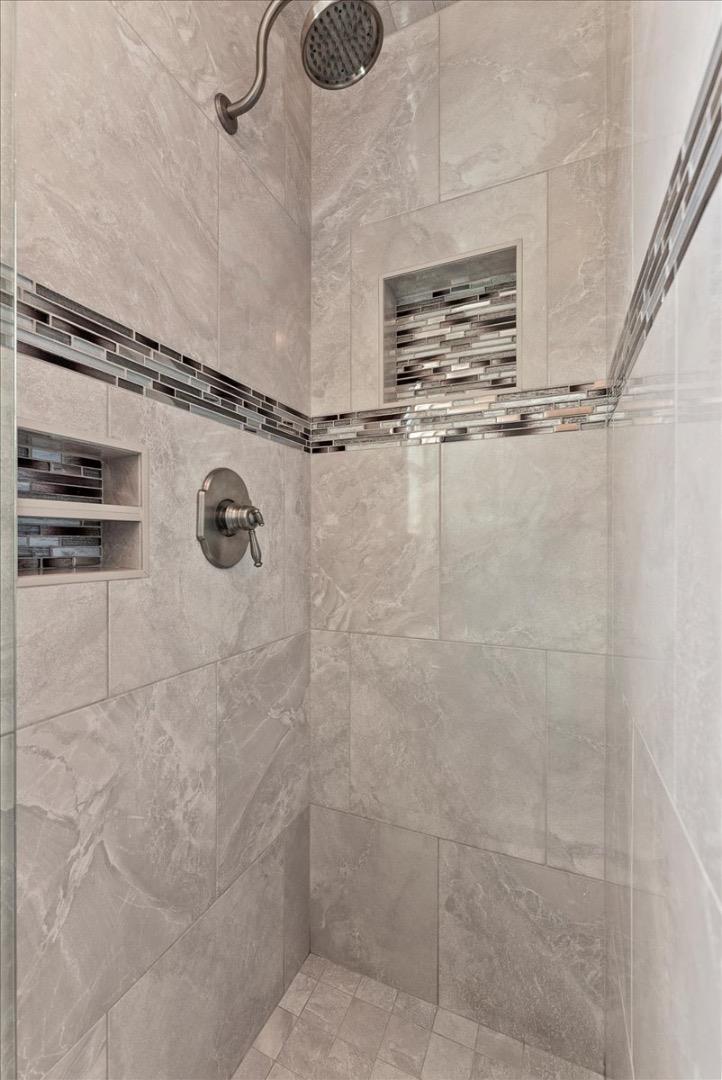 1648 Mt Rainier Avenue Milpitas, CA 95035 - Photo 27 of 34 a bathroom with a shower