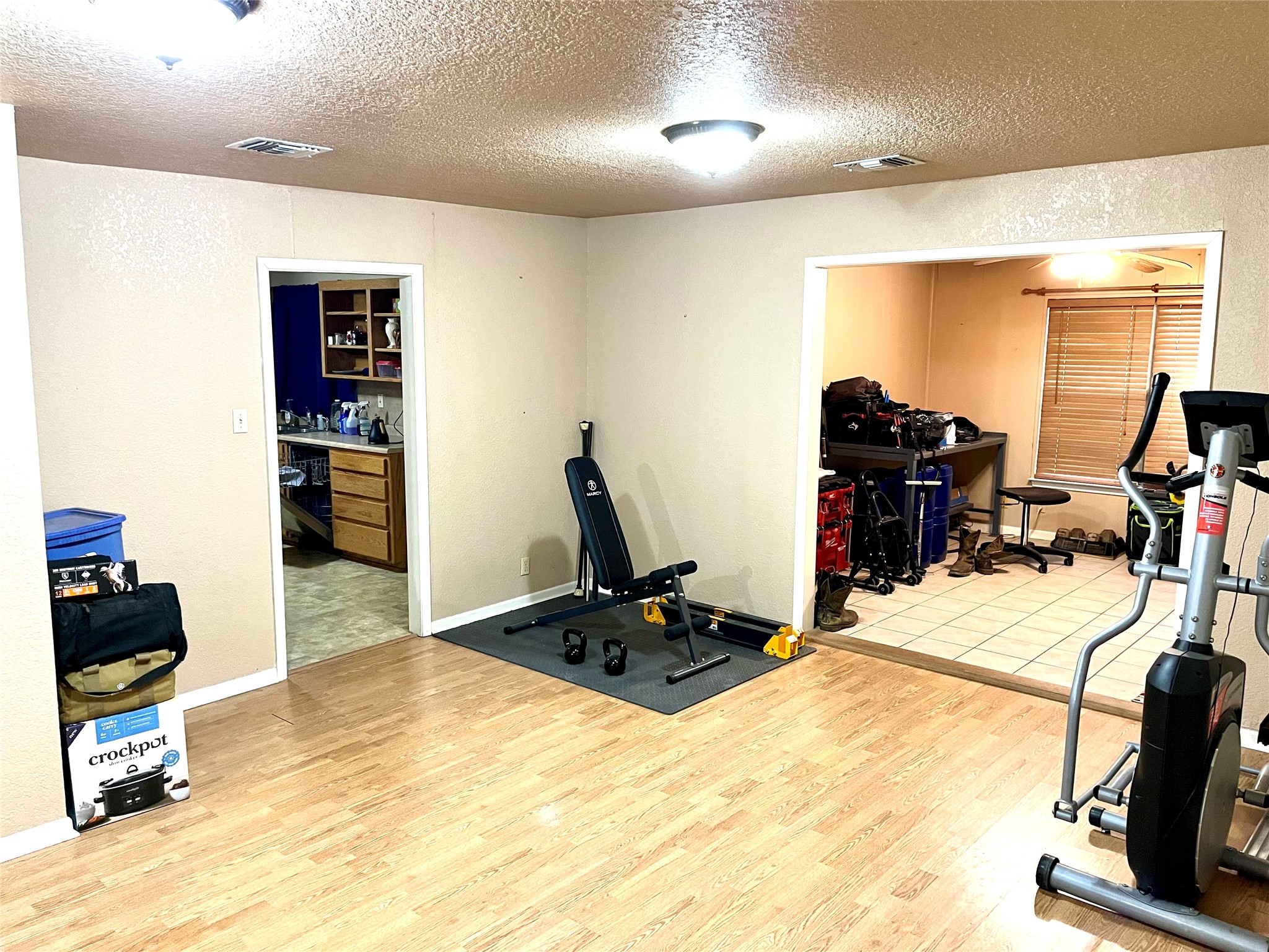 307 5th Street Sutherland Springs, TX 78161 - Photo 14 of 17 a room with gym equipment and a flat screen tv