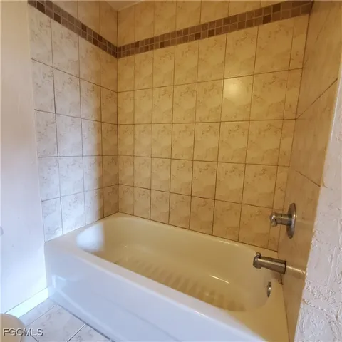 a bathroom with a bathtub