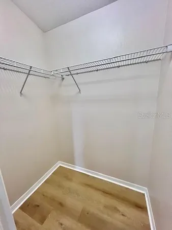 a view of a room with racks on the wall