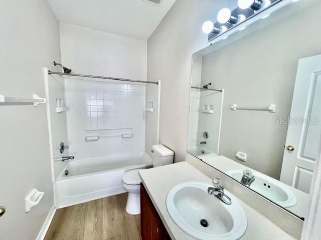 15633 Stable Run Drive Spring Hill, FL 34610 - Photo 30 of 50 a bathroom with a sink a toilet and shower