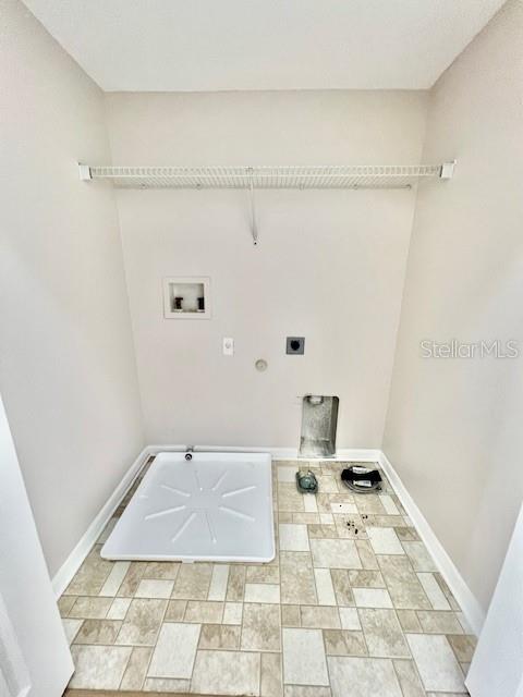 15633 Stable Run Drive Spring Hill, FL 34610 - Photo 37 of 50 a bathroom with a sink and a mirror