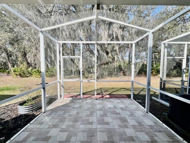15633 Stable Run Drive Spring Hill, FL 34610 - Photo 40 of 50 a view of an empty room with wooden floor