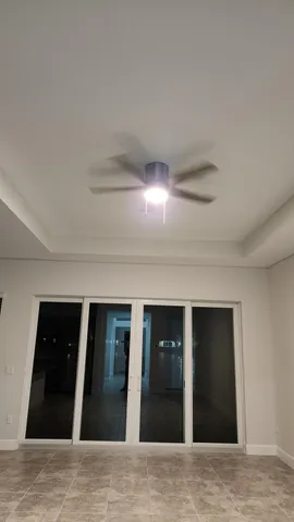 a view of a livingroom with wooden floor