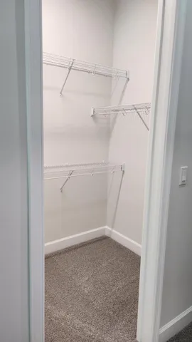 a view of a room with racks on the wall