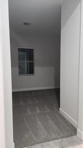 a bathroom with a granite countertop toilet a sink and bathtub