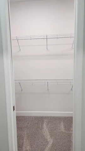 a bathroom with a granite countertop sink a shower and a mirror