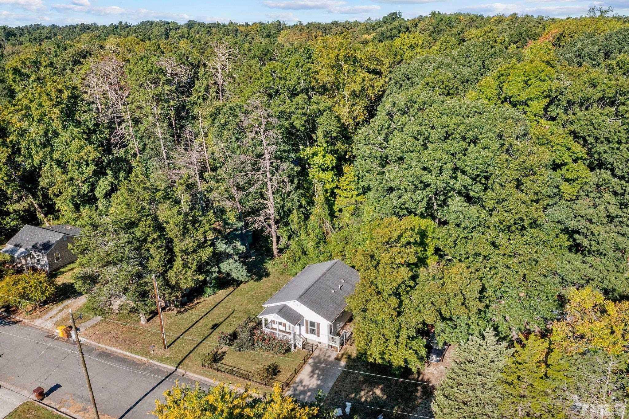 513 Jones Street Roxboro, NC 27573 - Photo 14 of 29 an aerial view of a house with a yard