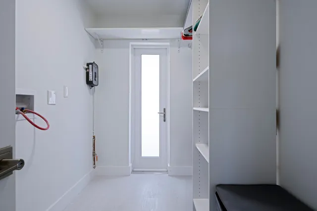 a view of a balcony with furniture