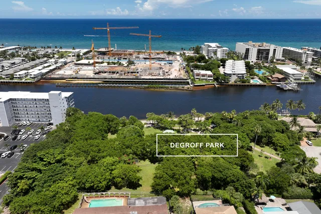 a view of a bunch of trees and street