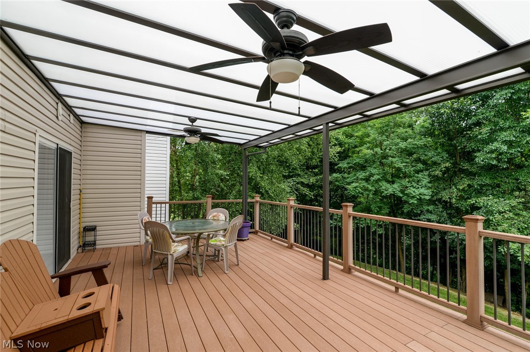 4490 Fenn Road Medina, OH 44256 - Photo 29 of 35 The breakfast area exits to a 22 X 14 covered, elevated, composite deck. Fabulous views of the woods, which is Medina County Park District land.