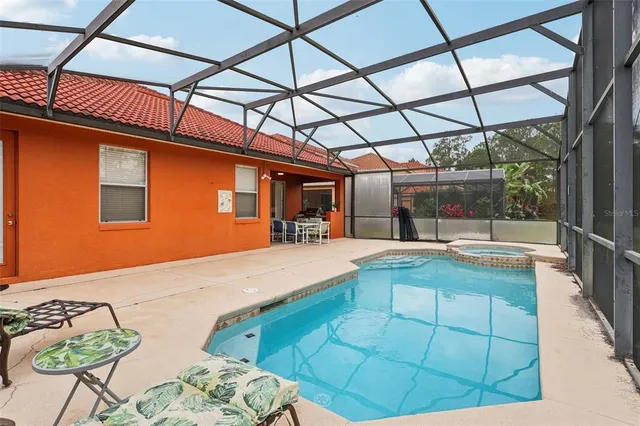 a view of a backyard of a house