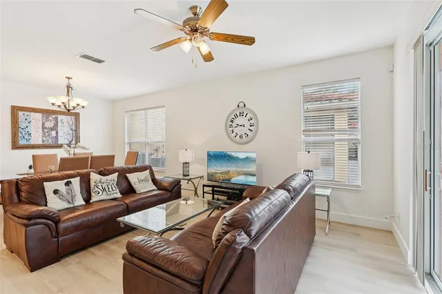 a living room with furniture and a window