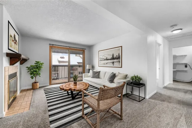 an empty room with fireplace