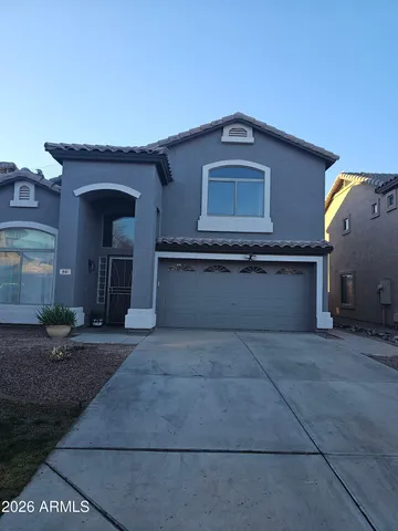 a front view of a house with yard