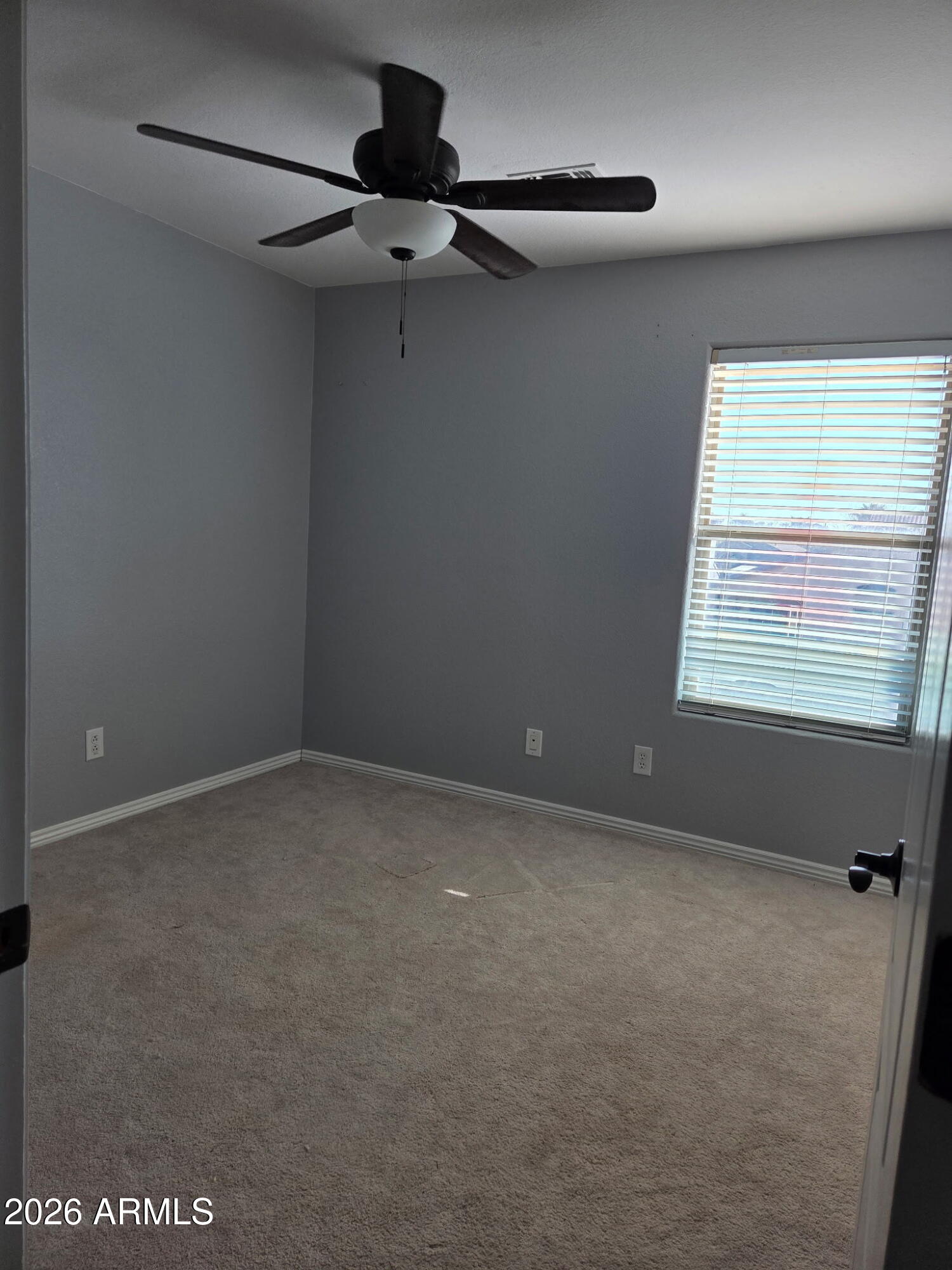 941 Mountain View Road San Tan Valley, AZ 85143 - Photo 17 of 48 a view of an empty room with a window