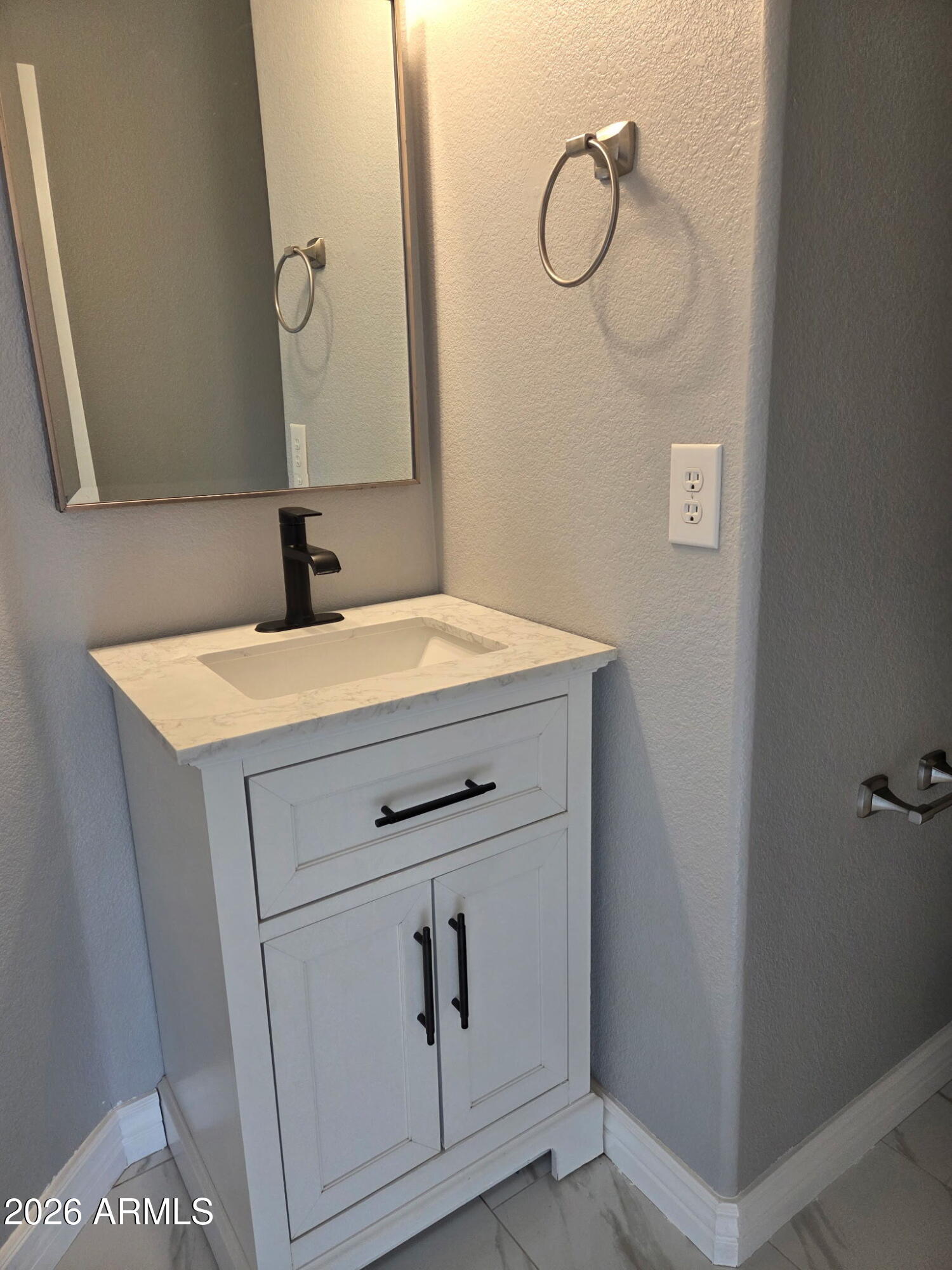 941 Mountain View Road San Tan Valley, AZ 85143 - Photo 37 of 48 a bathroom with a sink and mirror