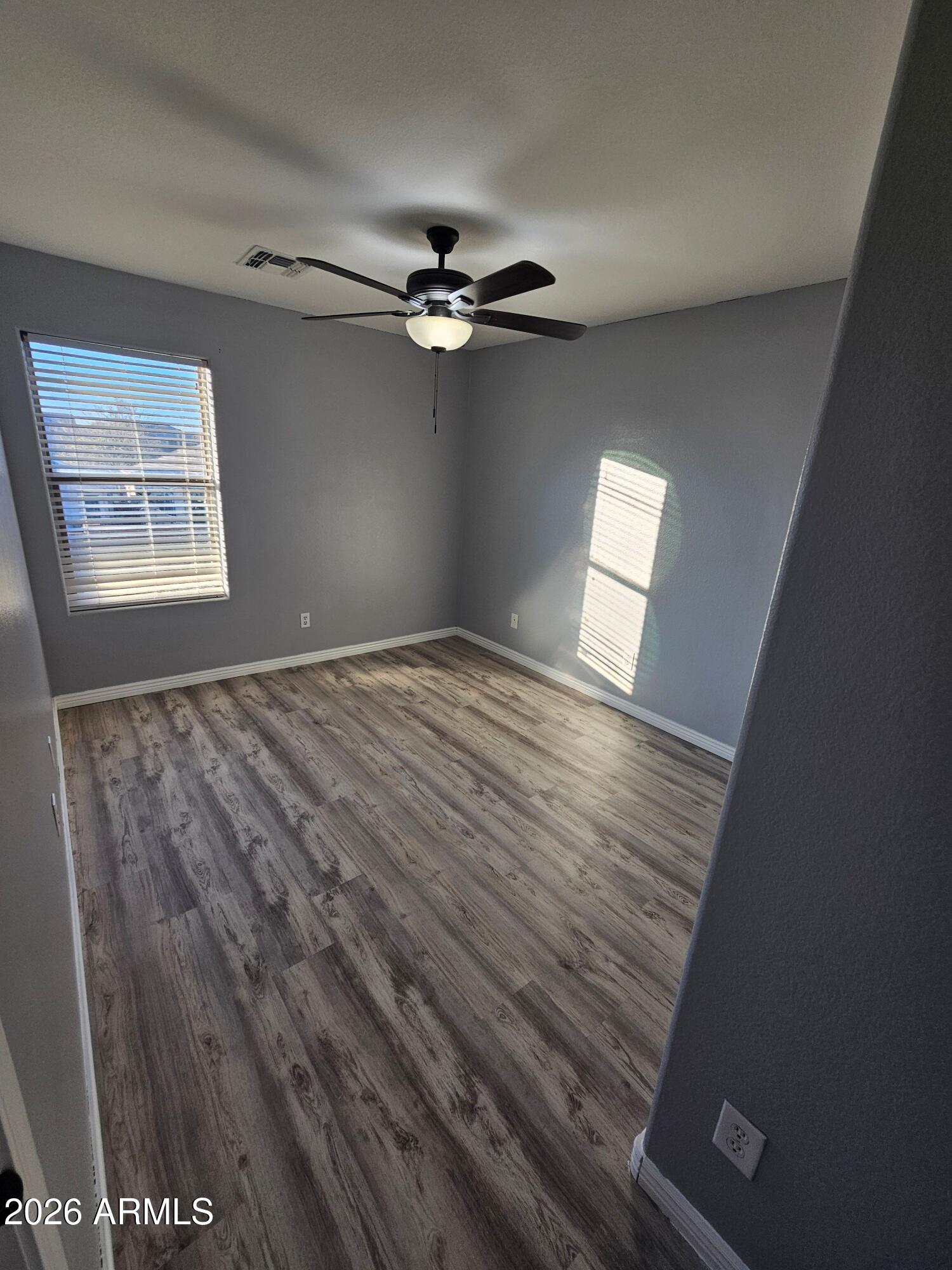941 Mountain View Road San Tan Valley, AZ 85143 - Photo 39 of 48 a view of an empty room with a window