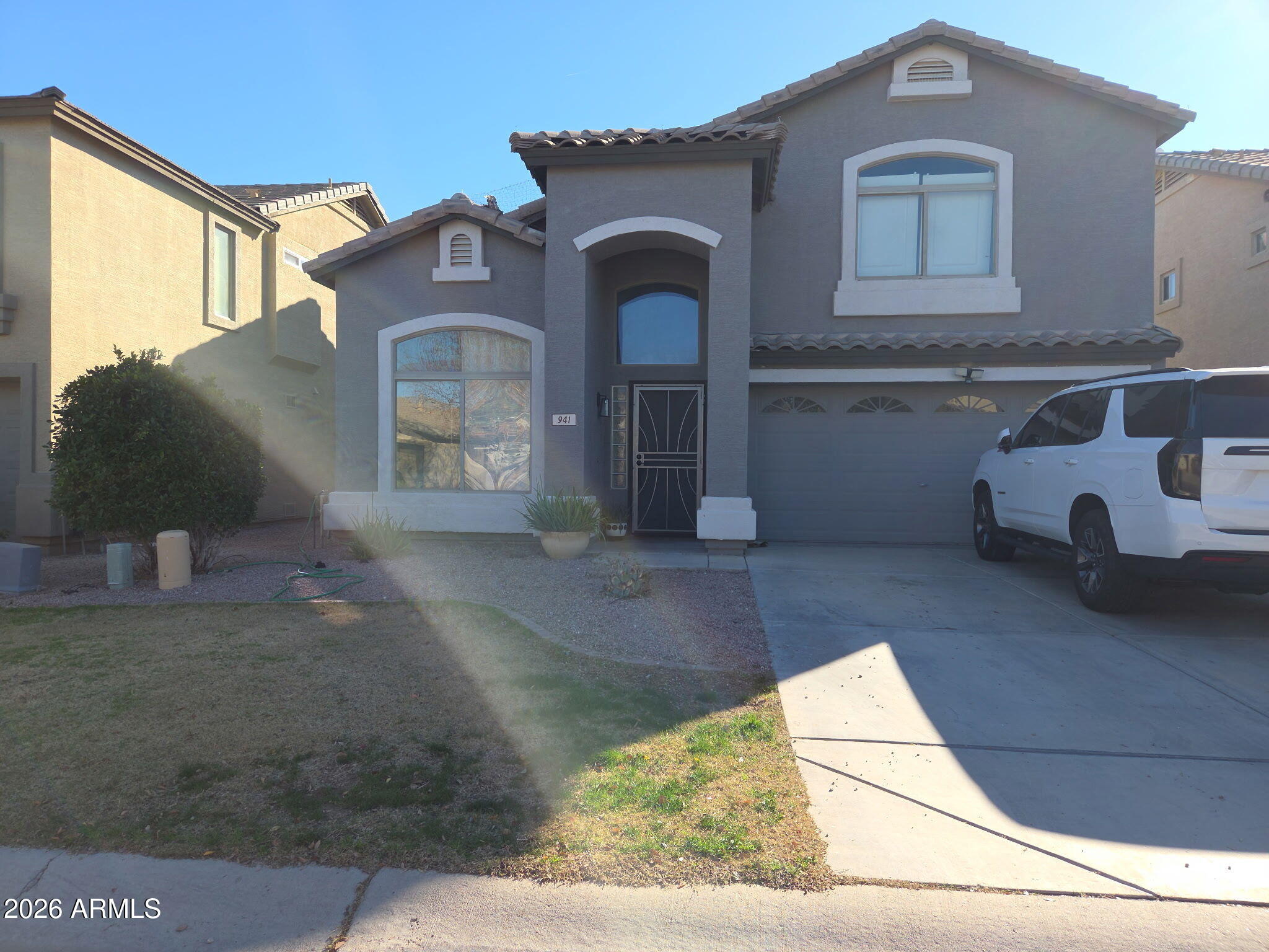 941 Mountain View Road San Tan Valley, AZ 85143 - Photo 48 of 48 a front view of a house with parking