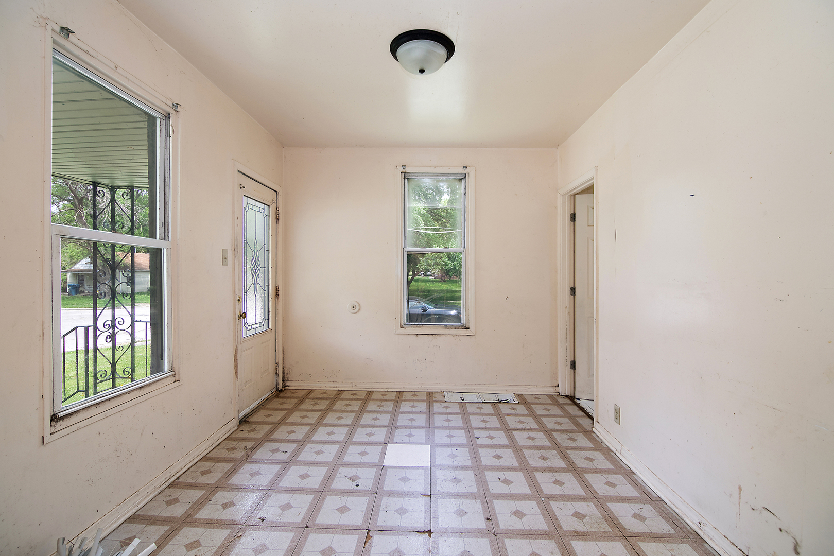 1990 Patrick Avenue Kankakee, IL 60901 - Photo 12 of 15 a view of an empty room with a window