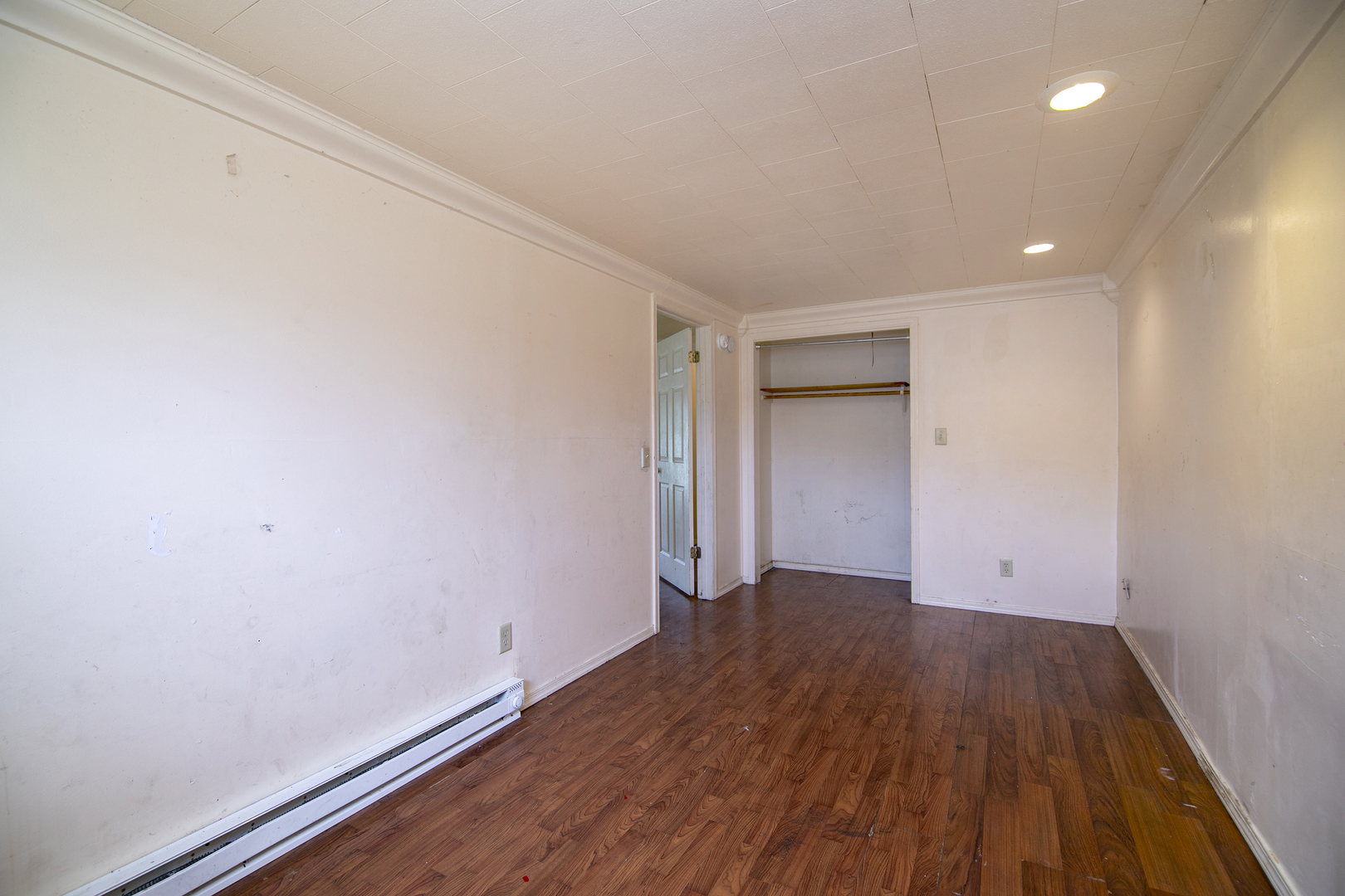 1990 Patrick Avenue Kankakee, IL 60901 - Photo 6 of 15 a view of an empty room with wooden floor