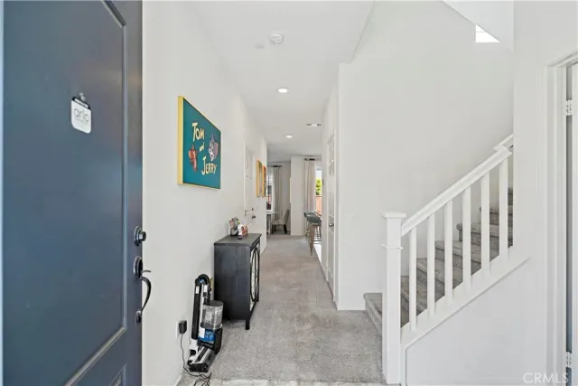 a view of a hallway with workspace