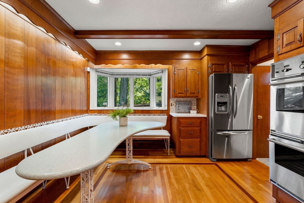 36 Independence Avenue Lexington, MA 02420 - Photo 14 of 33 a kitchen with stainless steel appliances granite countertop a refrigerator and a stove