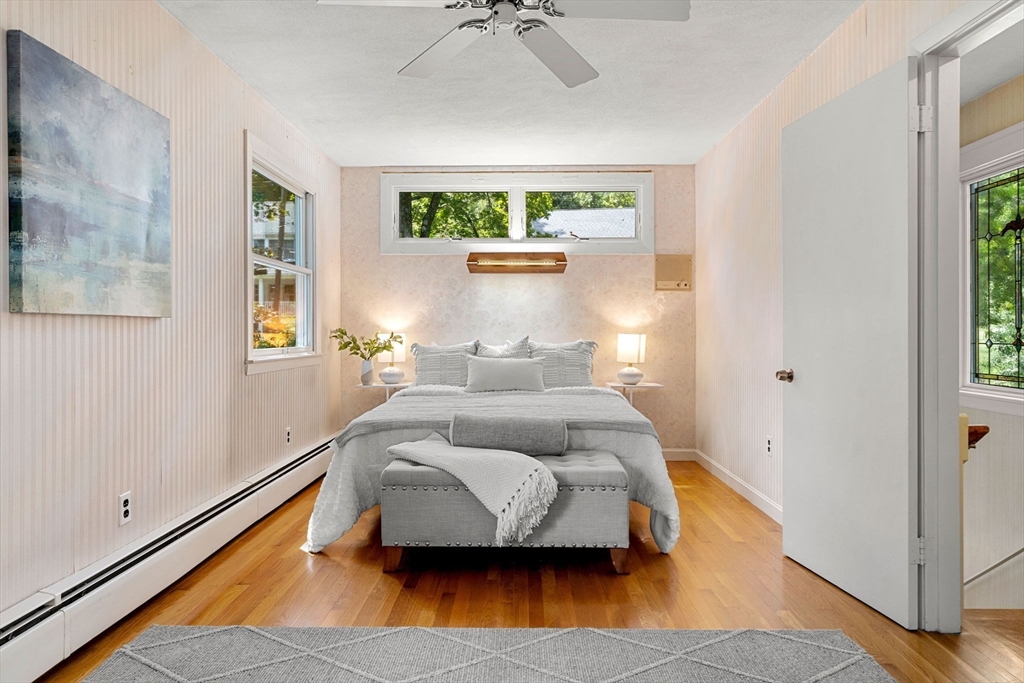 36 Independence Avenue Lexington, MA 02420 - Photo 19 of 33 a bedroom with a bed and window