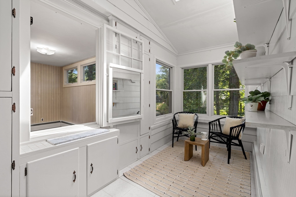 36 Independence Avenue Lexington, MA 02420 - Photo 21 of 33 a view of a workspace with furniture and a window