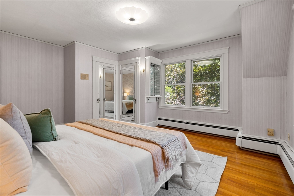 36 Independence Avenue Lexington, MA 02420 - Photo 22 of 33 a bedroom with a bed and window