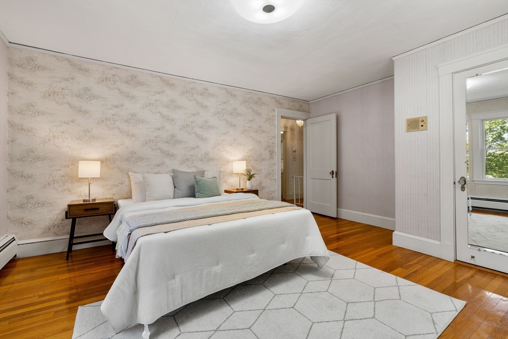 36 Independence Avenue Lexington, MA 02420 - Photo 23 of 33 a bedroom with a bed and a table