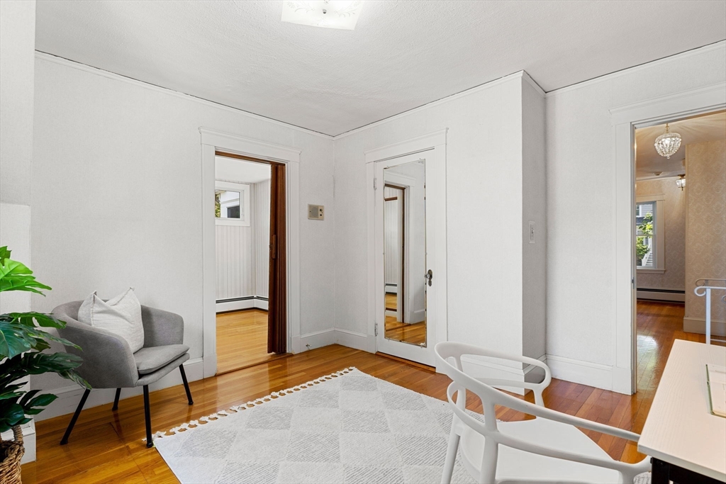 36 Independence Avenue Lexington, MA 02420 - Photo 26 of 33 a living room with furniture and a rug