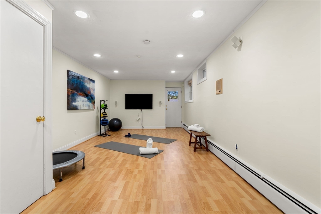 36 Independence Avenue Lexington, MA 02420 - Photo 28 of 33 a room with table and chairs