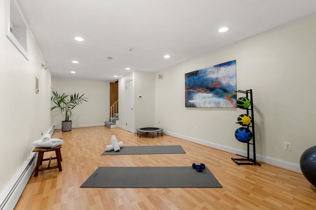 36 Independence Avenue Lexington, MA 02420 - Photo 29 of 33 a living room with furniture and wooden floor