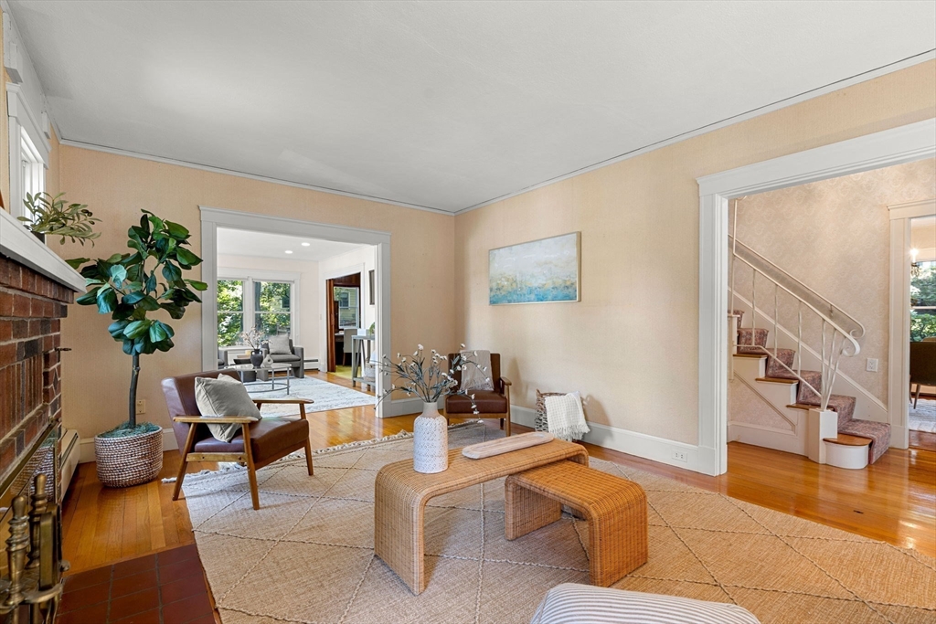 36 Independence Avenue Lexington, MA 02420 - Photo 4 of 33 a living room with furniture flowerpot and wooden floor